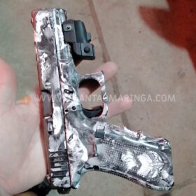Polícia Militar prende homem em tabacaria e apreende pistola com mira a laser e kit rajada em Maringá Foto 3 Fotos de Polícia Militar prende homem em tabacaria e apreende pistola com mira a laser e kit rajada em Maringá