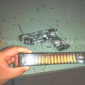Polícia Militar prende homem em tabacaria e apreende pistola com mira a laser e kit rajada em Maringá Foto 1 Fotos de Polícia Militar prende homem em tabacaria e apreende pistola com mira a laser e kit rajada em Maringá
